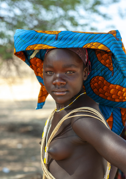 Mucubal tribe young woman with the ompota headdress, Namibe Province, Virei, Angola
