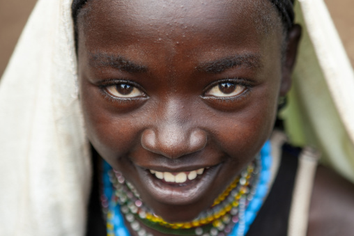 Veiled Dizi tribe girl with a shawl on the head, Omo Valley, Tum, Ethiopia