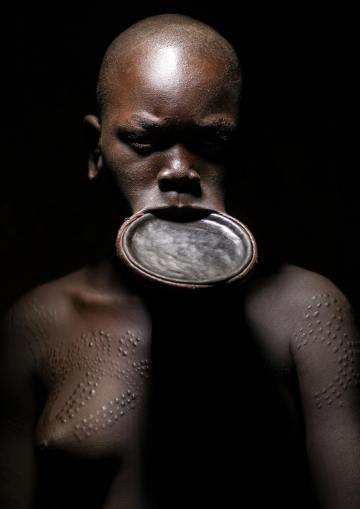 Surma woman wearing a lip plate, Turgit, Omo valley, Ethiopia