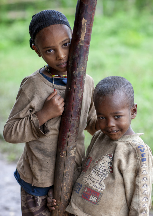 Shy poor children, Gurage, Gunshire, Ethiopia