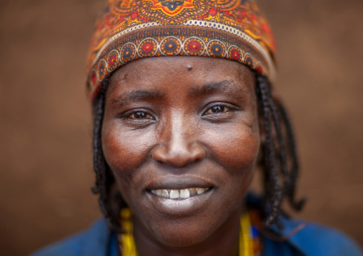 Smiling dime tribe woman, Hana Mursi, Omo valley, Ethiopia
