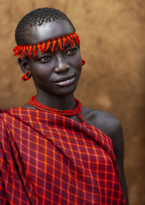 Portrait of a Bodi tribe woman with headband, Hana Mursi, Omo valley, Ethiopia
