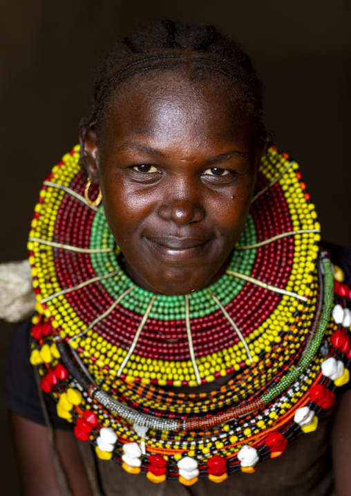 Turkana tribe woman with huge necklaces and ear rings, Turkana lake, Loiyangalani, Kenya
