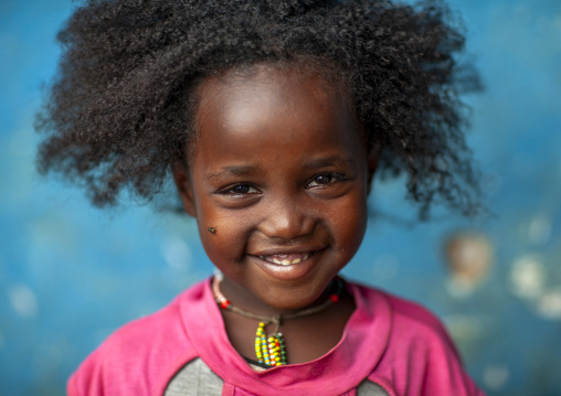 Portrait of a smiling girl, Ari zone, Jinka, Ethiopia