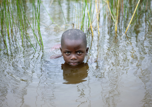 Rwandan boy having a bath, Lake kivu, Gisenye, Rwanda