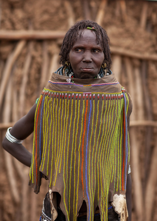 Portrait of a topossa woman, With traditional clothes, Omo valley, Kangate, Ethiopia