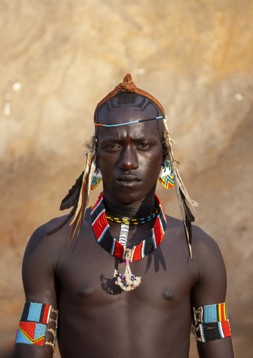 Tsamay tribe man whipper with body adorment, Omo Valley, Key Afer, Ethiopia