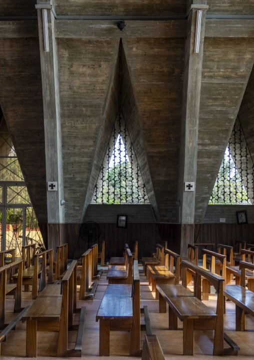 Triangular concrete roof structure and pews inside the Cathedral of Our Lady of Fatima, Benguela Province, Benguela, Angola