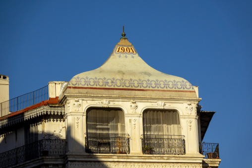 Ornate rooftop turret of a 1901 Belle Époque building with dated plaque, North Africa, Algiers, Algeria