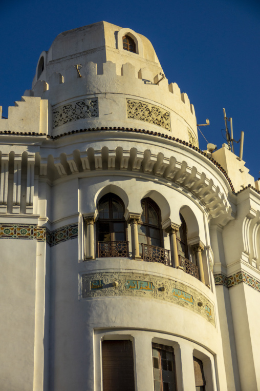 Neo-Moorish tower with crenellations and horseshoe-arch windows on a historic building, North Africa, Algiers, Algeria
