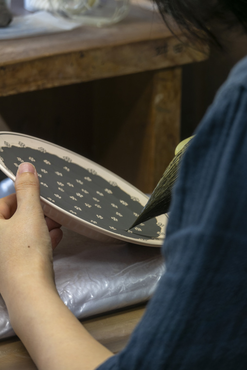 Artisan in Genemongama porcelain atelier, Kyushu region, Arita, Japan