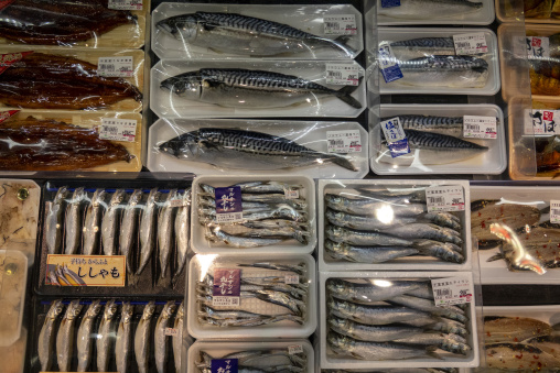 Fresh fish and seafood displayed in a Japanese supermarket, Kyus