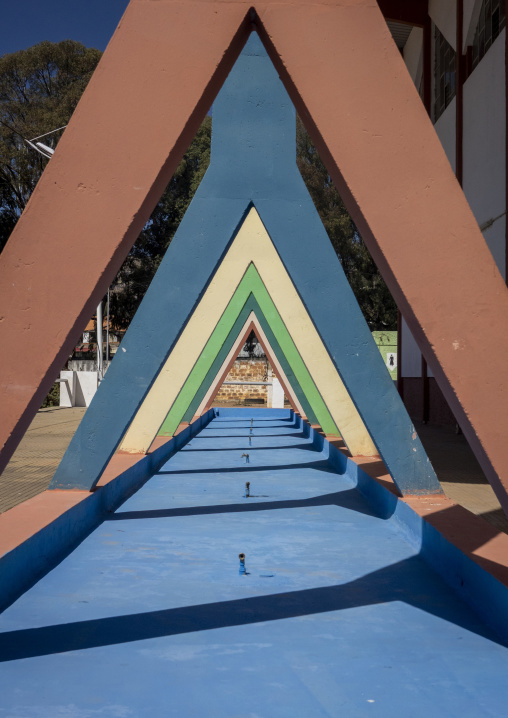 Colorful triangular arches forming a covered walkway at the old Portuguese exhibition grounds, Huila Province, Lubango, Angola