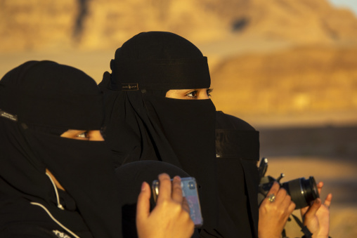 Portrait of women wearing black niqab, Al Madinah Province, Alul