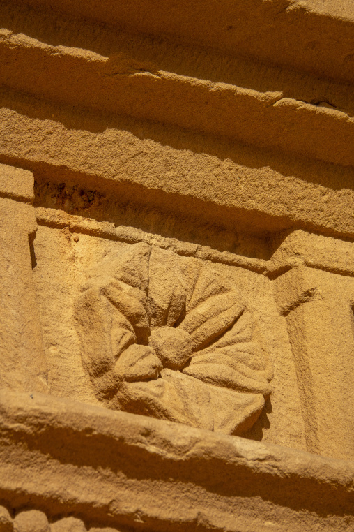 Rosette carving on a Nabataean tomb pediment at Hegra, Al Madina
