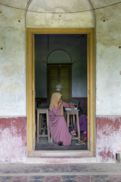 Veiled girl in an heritage house at Pakutia Zamindar Bari, Dhaka Division, Nagarpur, Bangladesh