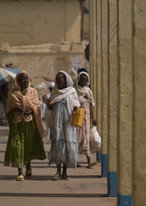 Eritrean women walking under arcades, Anseba, Keren, Eritrea