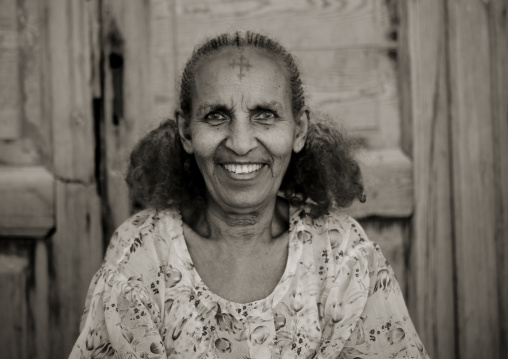 Portrait of a smiling eritrean woman with traditional hairstyle, Northern Red Sea, Massawa, Eritrea