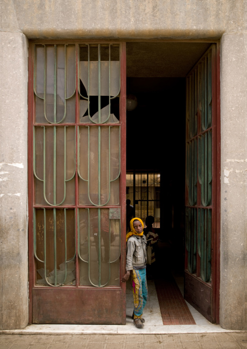 Eritrean boy  in falletta building entrance, Central Region, Asmara, Eritrea