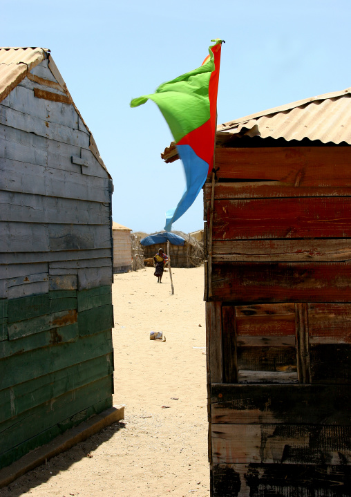 Flag on wooden houses, Northern Red Sea, Thio, Eritrea