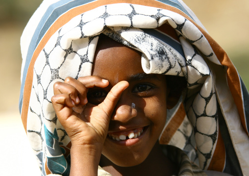Boy pretending to click with a photo camera, Central Region, Asmara, Eritrea
