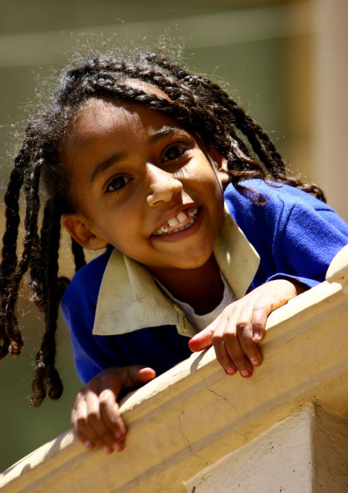 Eritrean smiling girl with dreadlocks, Central Region, Asmara, Eritrea