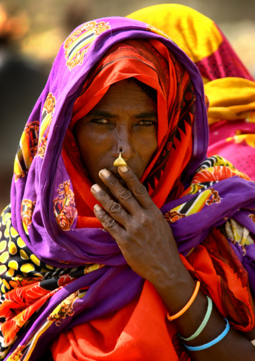 Eritrean woman with nose ring in colorful clothes, Debub, Senafe, Eritrea
