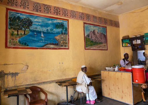 Mulsim men in a decorated restaurant, Semien-Keih-Bahri, Keren, Eritrea