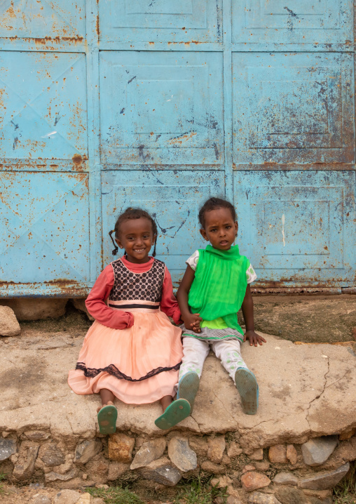 Eritrean children sit in front of their house, Semien-Keih-Bahri, Keren, Eritrea
