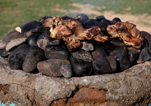Meat cooked on heated stones, Gash-Barka, Agordat, Eritrea