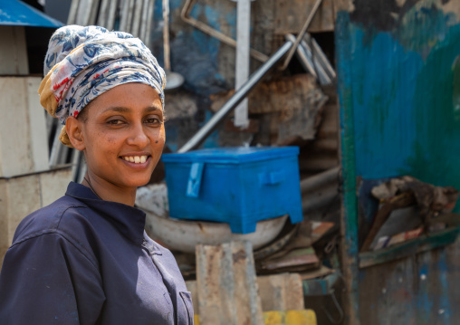 Eritrean woman working in the Medebar metal market, Central region, Asmara, Eritrea