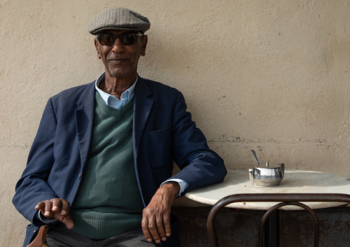 Old eritrean man in a bar, Central region, Asmara, Eritrea