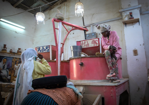 Eritrean people bringing grains to grind in a mill, Central region, Asmara, Eritrea