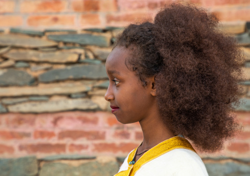 Portrairt of an eritrean orthodox girl with traditional hairstyle, Central region, Asmara, Eritrea