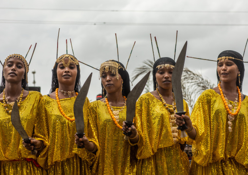 Afar tribe women dancing with a jile knife during expo festival, Central region, Asmara, Eritrea