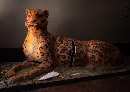 Broken cheetah statue in the opera house, Central region, Asmara, Eritrea