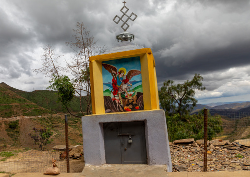 Orthodox donation box along the road against a dramatic sky, Central region, Asmara, Eritrea