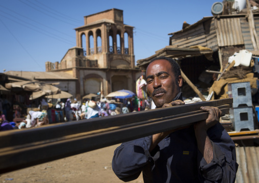 Eritrean worker at medebar metal market, Central Region, Asmara, Eritrea