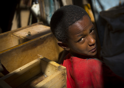Eritrean child in medebar metal market, Central Region, Asmara, Eritrea