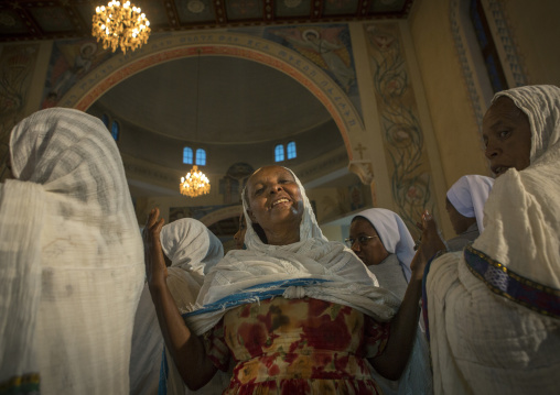 Eritrean people praying in a church, Central Region, Asmara, Eritrea