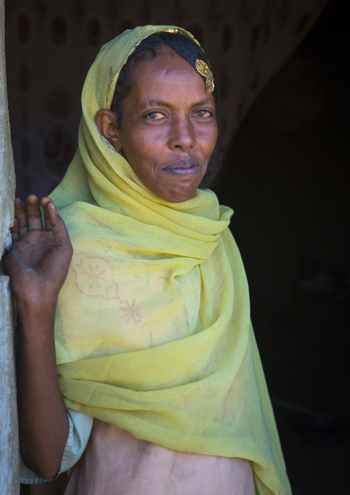 Bilen tribe woman in front of her house, Anseba, Keren, Eritrea