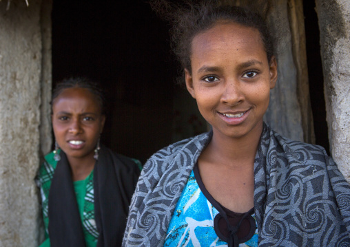 Bilen tribe teenagers in front of their house, Anseba, Keren, Eritrea