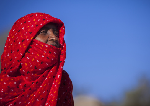 Portrait of an eritrean woman in red scarf, Anseba, Keren, Eritrea