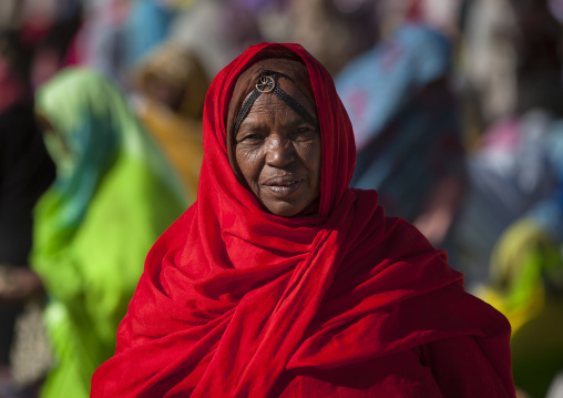 Old eritrean woman in red scarf in the monday market, Anseba, Keren, Eritrea