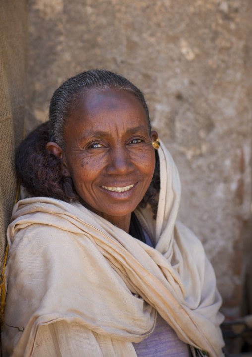 Portrait of an eritrean woman with traditional hairstyle, Debub, Mendefera, Eritrea