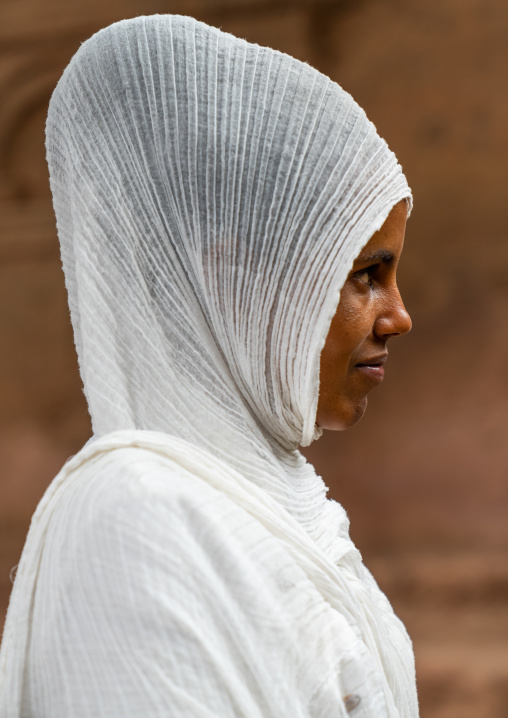 Ethiopian woman pilgrim with a white shawl, Amhara Region, Lalibela, Ethiopia