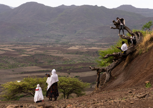Ethiopian people in front of a landscape, Amhara Region, Lalibela, Ethiopia