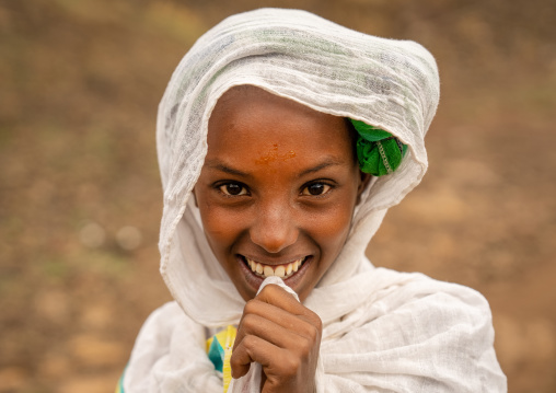 Portrait of a smiling ethiopian girl, Amhara Region, Lalibela, Ethiopia