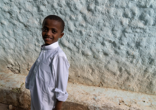 Muslim boy in Aw Abadir Awaach shrine, Harari Region, Harar, Ethiopia