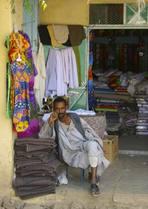 Eritrean man sitting in front of a shop, Anseba, Keren, Eritrea
